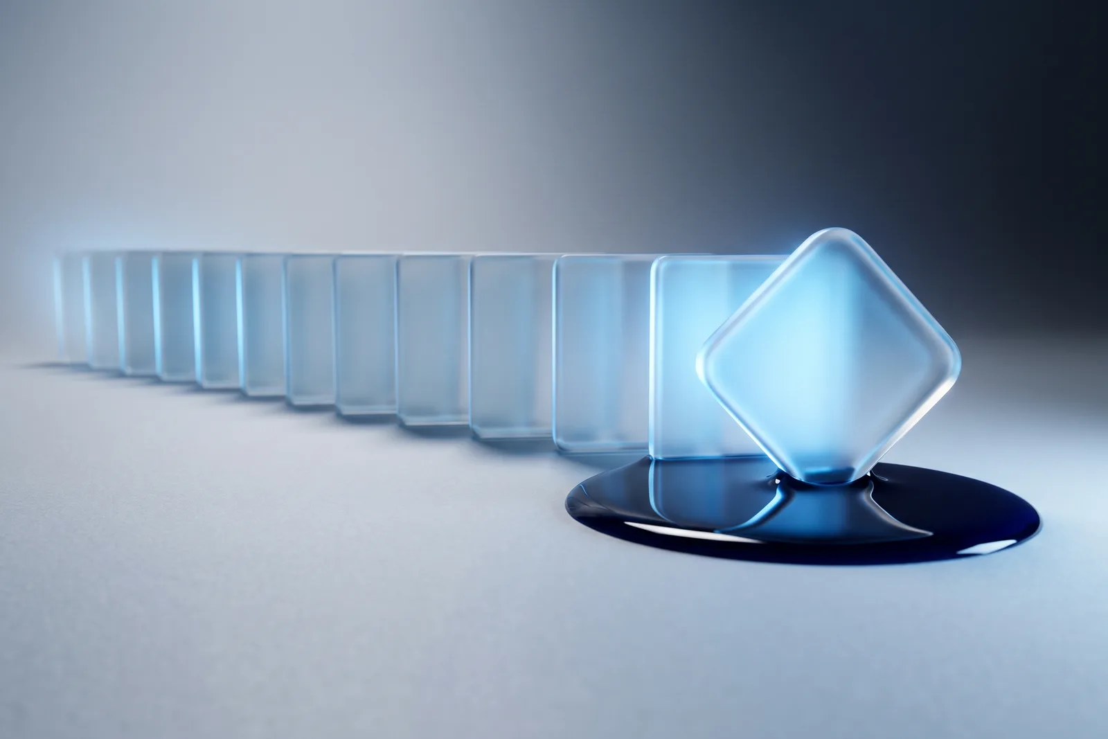 A long row of frosted glass tiles lit blue in sequence, ending in a rounded-diamond tile standing in a pool of navy ink.